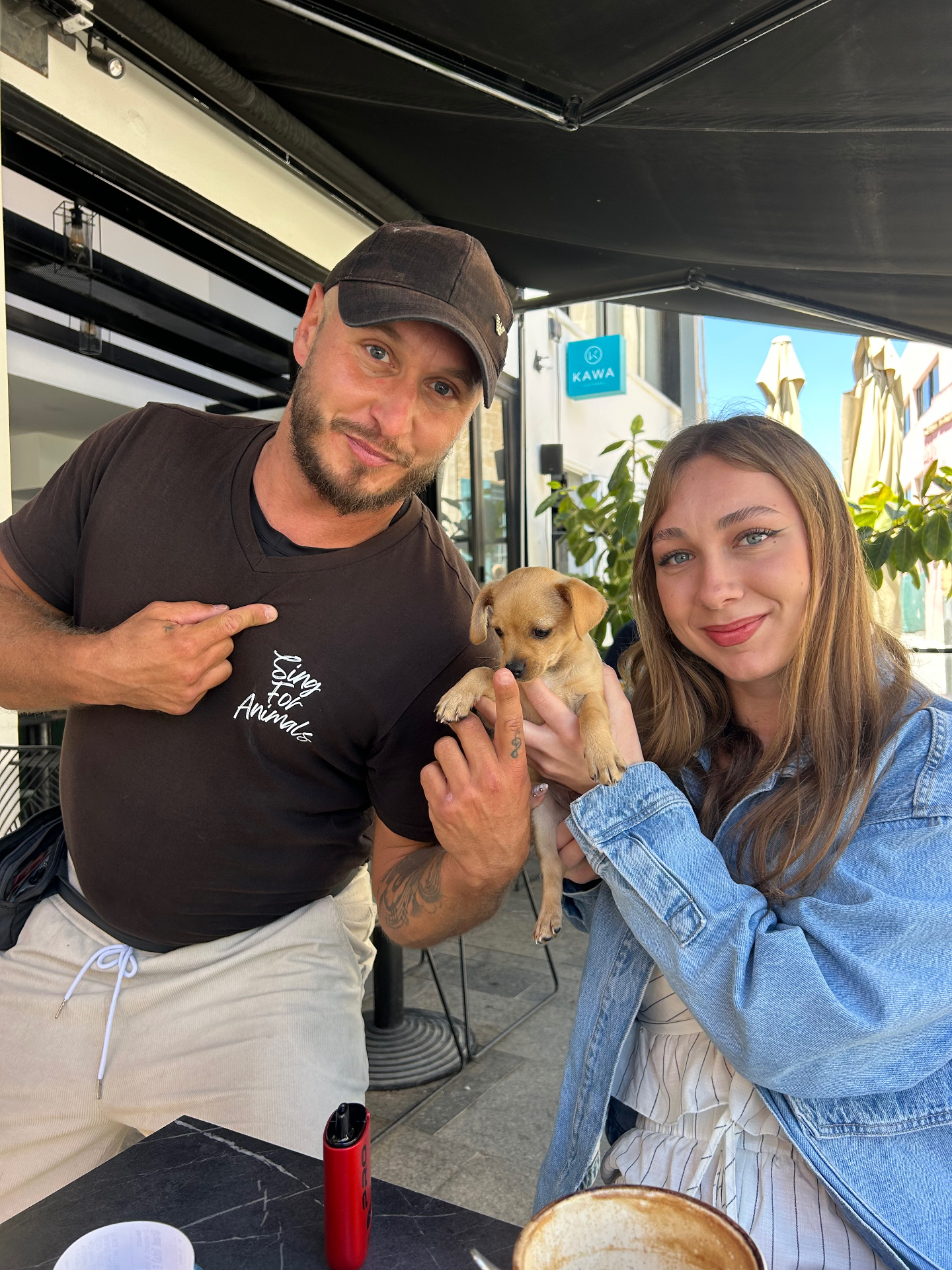 Romeo and Claudia with a puppy