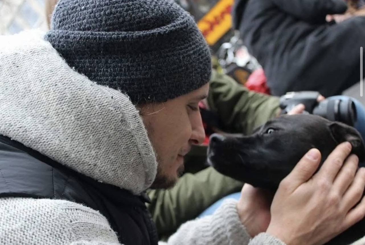 Romeo with a rescued dog